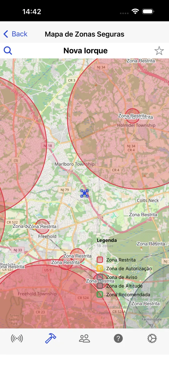 Mapa de zonas seguras com círculos vermelhos de zonas restritas e legenda para zonas restritas, com autorização, de aviso, de altitude e recomendadas.